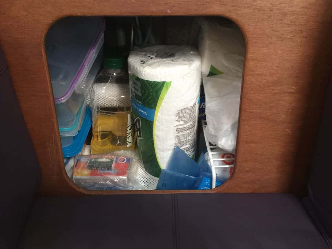 Storage behind port settee