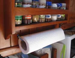 The perfect paper towel holder for a boat, RV or anywhere a breeze can blow in through the window. Cheap, easy and solves paper towels