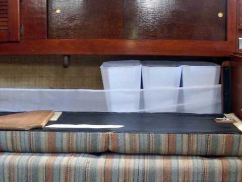 "Boxed" wine is great on a boat . . . but how can you avoid the cardboard? Make your own plastic box for the interior bladder, so it's still easy to pour.